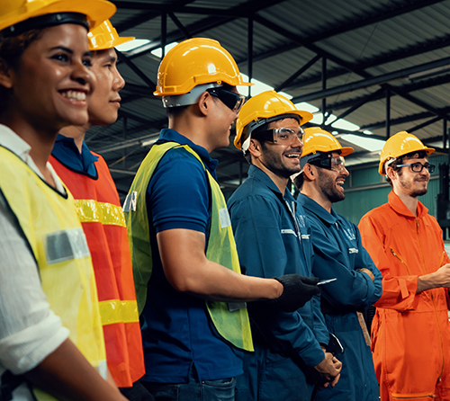 Skillful worker attending brief meeting in the factory .